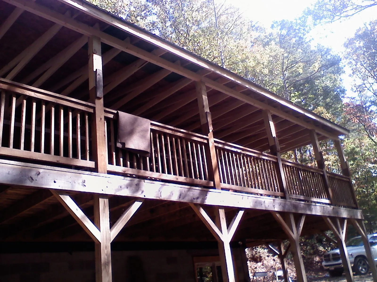 Timber framing under a new elevated porch and deck — Roof Leak Repair in Massey by Roofing Brothers